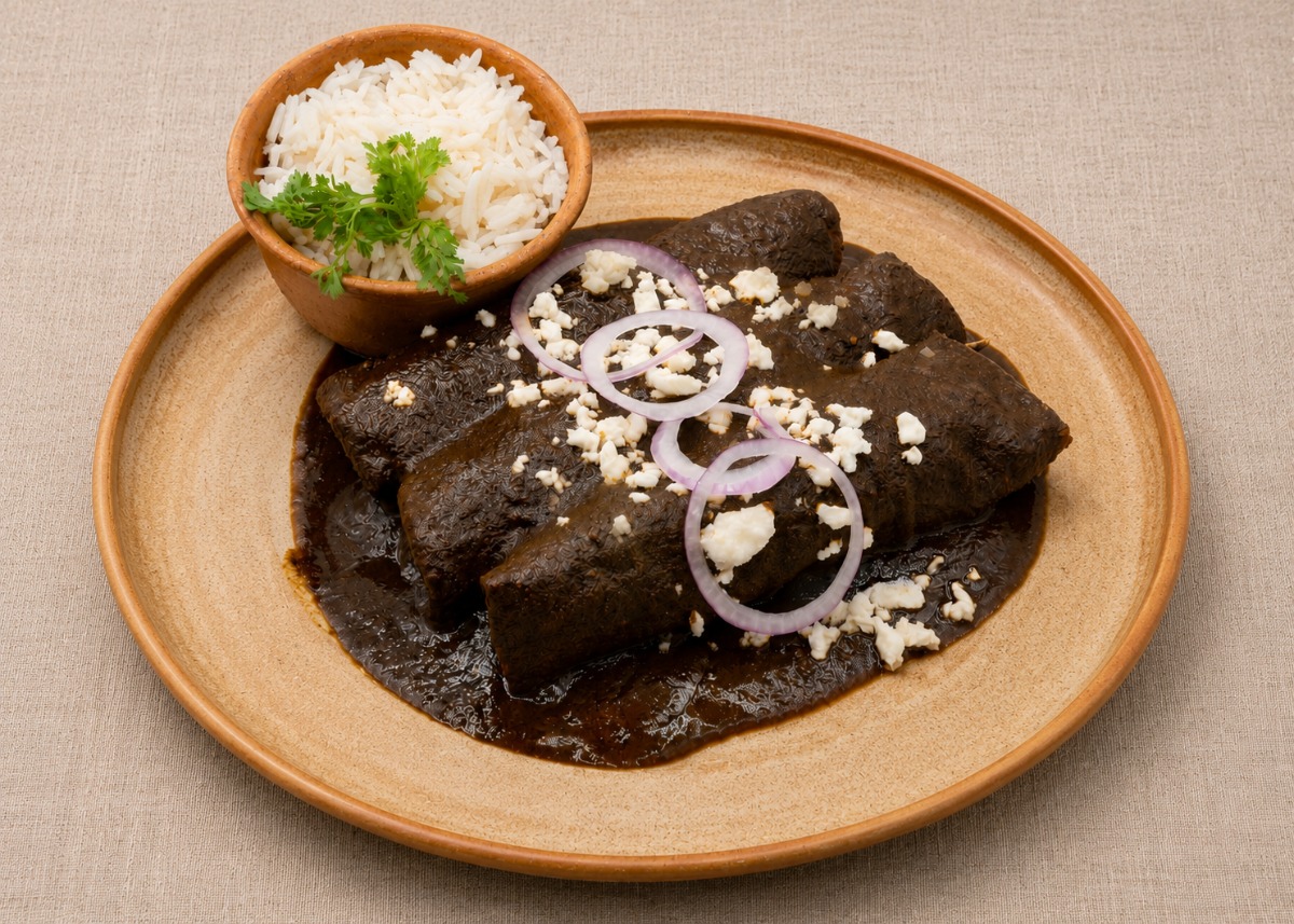 Mole negro oaxaqueño enchiladas with rice and queso fresco, San Francisco