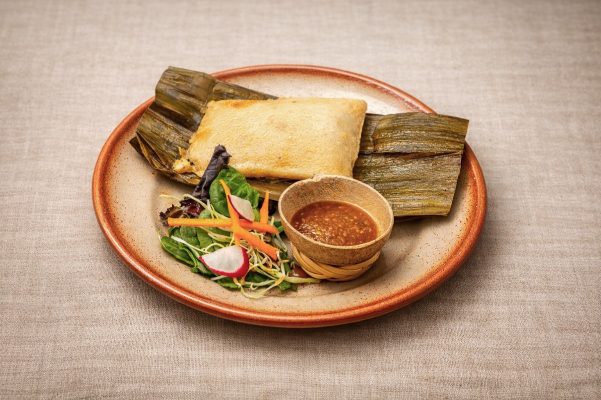 Tamal oaxaqueño en hoja de plátano Oaxacan tamal wrapped in banana leaf, Café de Olla San Francisco